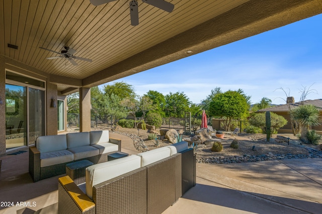 view of patio featuring an outdoor living space and ceiling fan