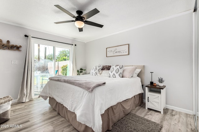 bedroom featuring crown molding, access to outside, light wood-style flooring, and a textured ceiling