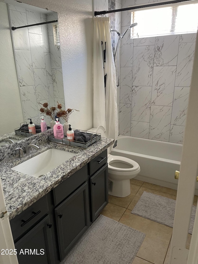 1314 S Larkspur St, Gilbert, AZ 85296 - bathroom with shower / bath combo with shower curtain, vanity, a textured wall, toilet, and tile patterned floors