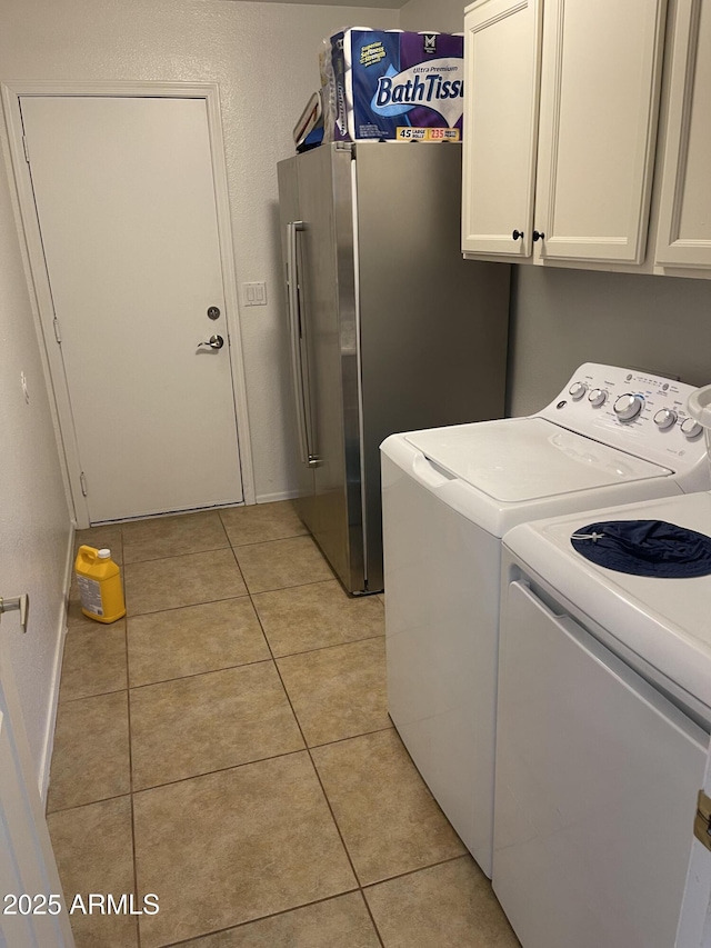 1314 S Larkspur St, Gilbert, AZ 85296 - washroom featuring separate washer and dryer, cabinet space, baseboards, and light tile patterned flooring