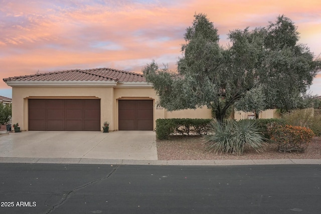 view of front of property featuring a garage