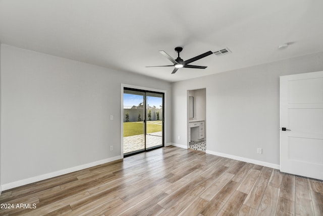 unfurnished room featuring light hardwood / wood-style floors and ceiling fan