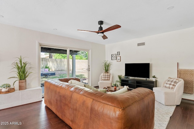 5912 E Wethersfield Rd, Scottsdale, AZ 85254 - living room with ceiling fan and dark wood-type flooring