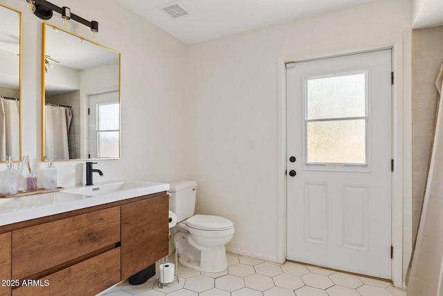 5912 E Wethersfield Rd, Scottsdale, AZ 85254 - full bath with vanity and tile patterned floors
