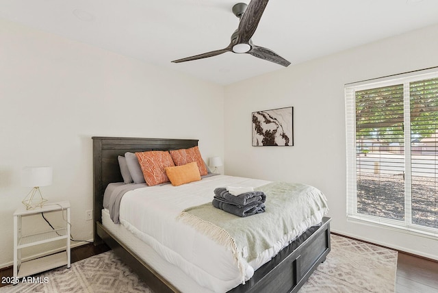 5912 E Wethersfield Rd, Scottsdale, AZ 85254 - bedroom with light wood-style floors and a ceiling fan