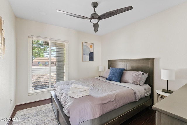 5912 E Wethersfield Rd, Scottsdale, AZ 85254 - bedroom featuring dark wood finished floors and a ceiling fan
