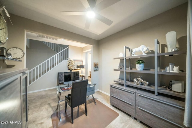 office featuring carpet and ceiling fan