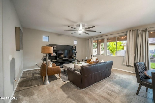 living room with carpet and ceiling fan