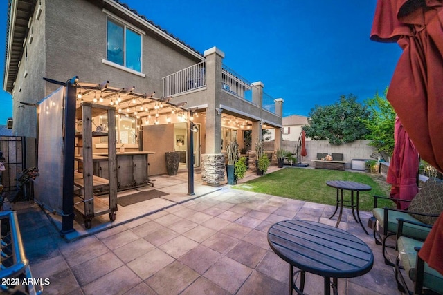 view of patio / terrace featuring a balcony