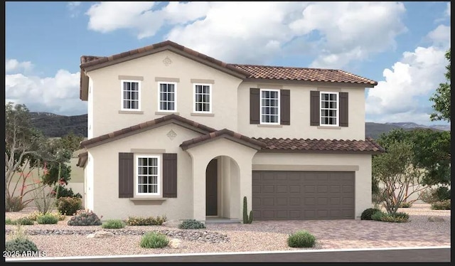 5014 W Hardtack Trl, Laveen, AZ 85339 - mediterranean / spanish home featuring a tile roof, a garage, driveway, and stucco siding