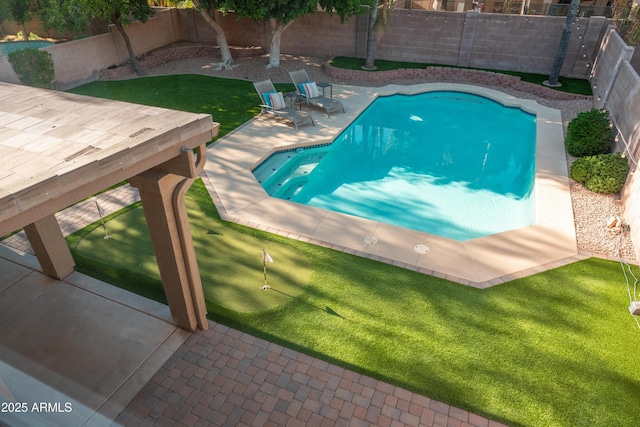 view of pool with a putting green, a patio, and a fenced backyard