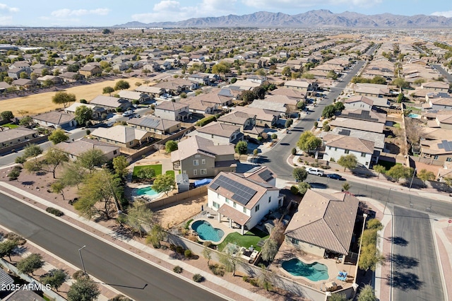 bird's eye view with a mountain view