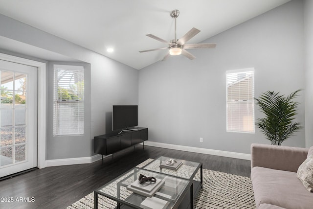 1055 E Ingram St, Mesa, AZ 85203 - living area with vaulted ceiling, dark wood-style floors, and a ceiling fan
