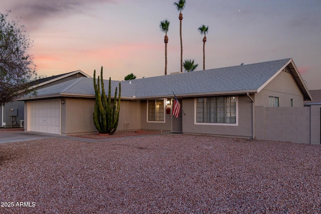 1055 E Ingram St, Mesa, AZ 85203 - single story home featuring a garage, driveway, and a shingled roof