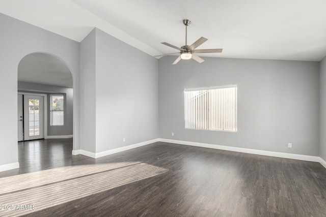 1055 E Ingram St, Mesa, AZ 85203 - empty room featuring arched walkways, vaulted ceiling, a ceiling fan, and dark wood finished floors