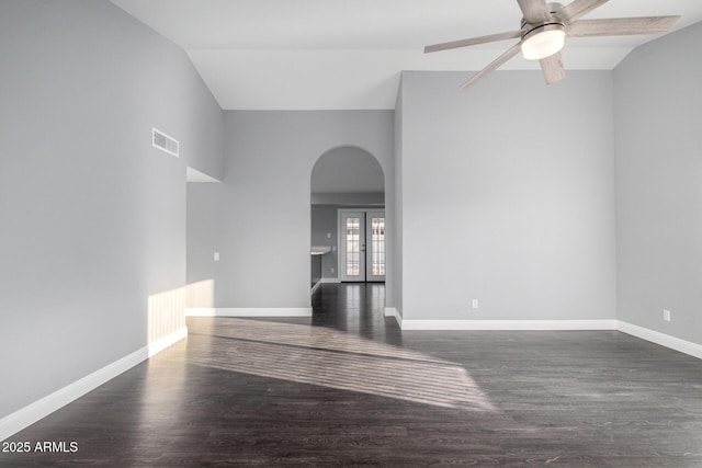 1055 E Ingram St, Mesa, AZ 85203 - empty room featuring arched walkways, ceiling fan, wood finished floors, and lofted ceiling