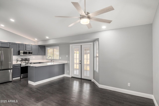 1055 E Ingram St, Mesa, AZ 85203 - kitchen featuring stainless steel appliances, light countertops, a peninsula, french doors, and lofted ceiling