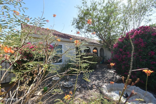 exterior space with stucco siding