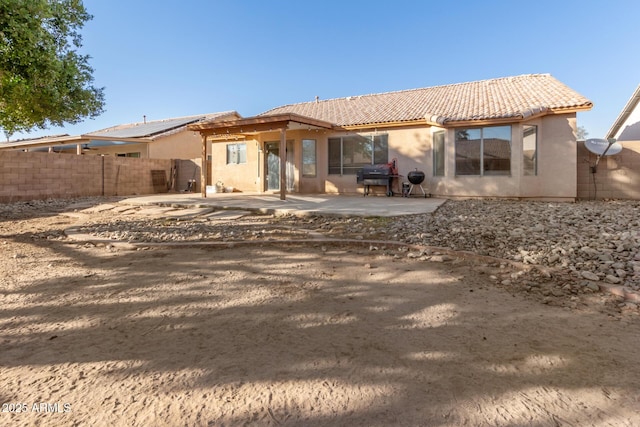 back of house featuring a patio