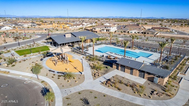 aerial view with a mountain view and a residential view