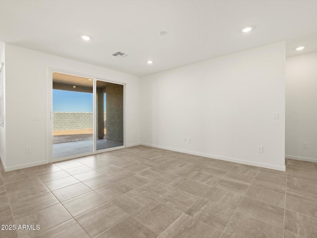 spare room with light tile patterned floors, recessed lighting, baseboards, and visible vents