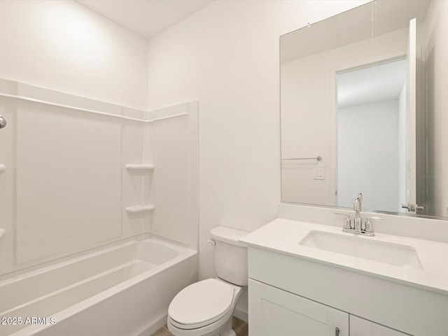 bathroom with washtub / shower combination, toilet, and vanity