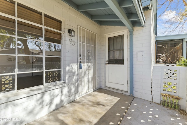 doorway to property featuring a patio area