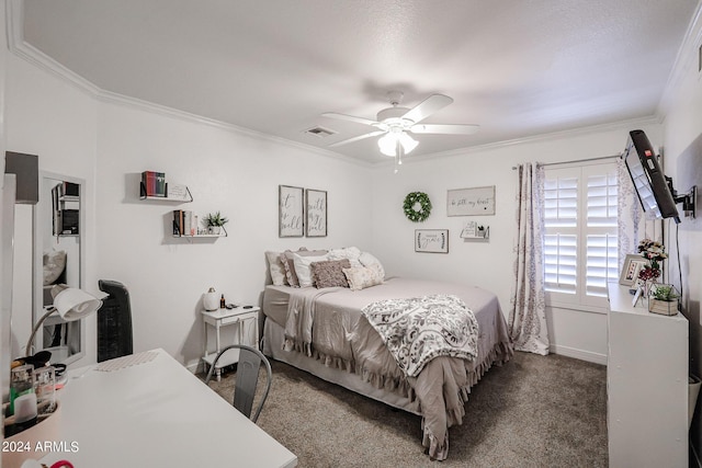 bedroom with crown molding, ceiling fan, and dark colored carpet