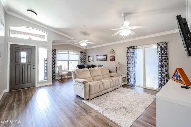 living room featuring ceiling fan, ornamental molding, and wood-type flooring