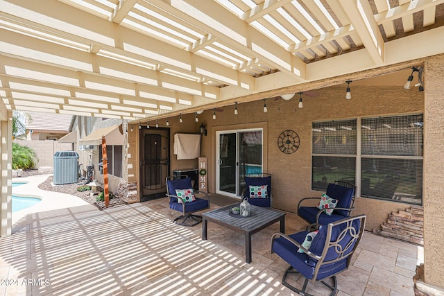 view of patio featuring central AC unit and a pergola