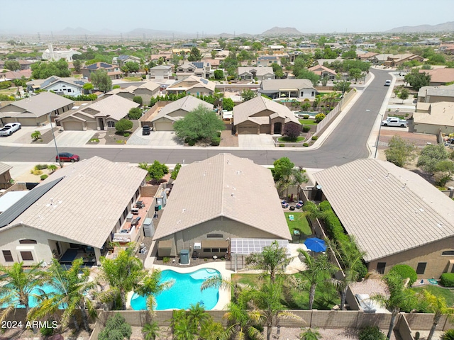 birds eye view of property with a mountain view