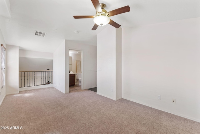 753 N Port Dr, Gilbert, AZ 85233 - unfurnished room featuring light colored carpet, a ceiling fan, and baseboards