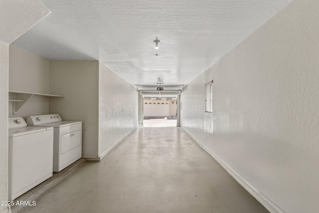 753 N Port Dr, Gilbert, AZ 85233 - hall with washing machine and clothes dryer, concrete flooring, baseboards, and a textured ceiling
