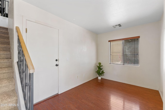 753 N Port Dr, Gilbert, AZ 85233 - entryway with wood finished floors, stairs, and baseboards
