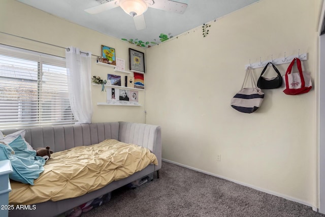 bedroom featuring ceiling fan, carpet floors, and baseboards