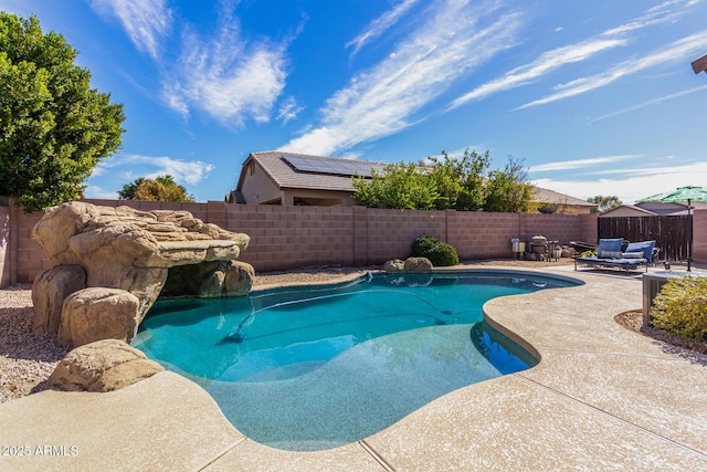 view of swimming pool with a fenced in pool, a fenced backyard, a patio, and an outdoor hangout area
