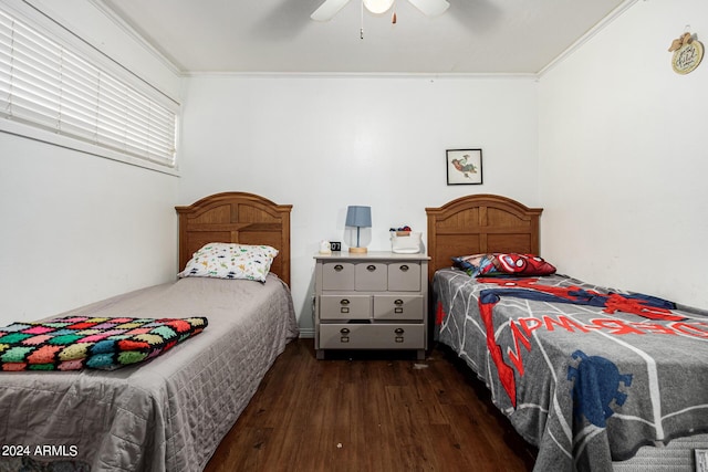 bedroom with ceiling fan, dark hardwood / wood-style flooring, and crown molding