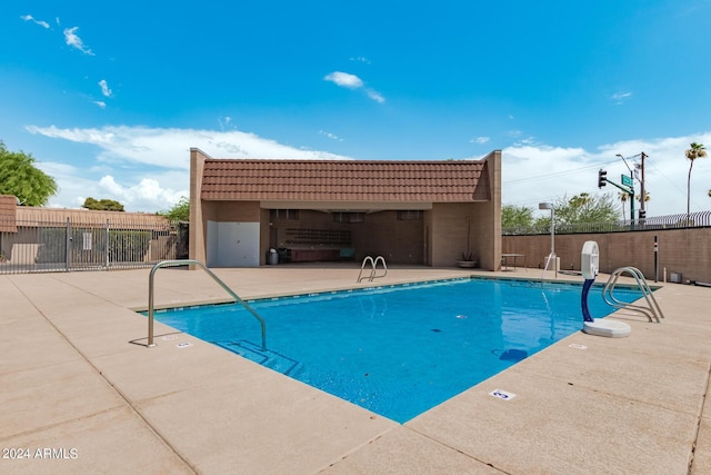 view of pool featuring a patio