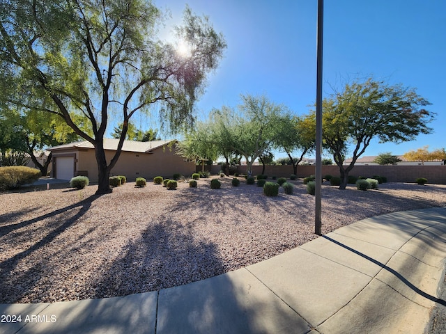 view of property exterior with a garage