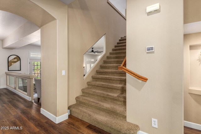 24916 N 80th Ln, Peoria, AZ 85383 - stairway with baseboards, wood finished floors, arched walkways, and a ceiling fan