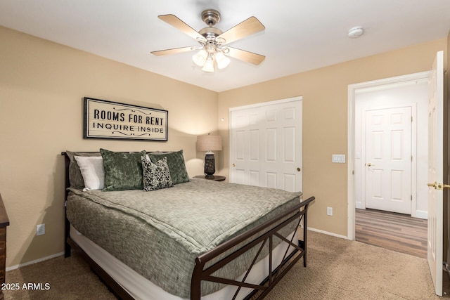 24916 N 80th Ln, Peoria, AZ 85383 - carpeted bedroom featuring baseboards, a closet, and a ceiling fan
