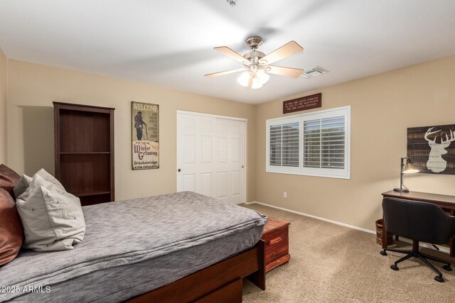 24916 N 80th Ln, Peoria, AZ 85383 - bedroom with light carpet, baseboards, and a ceiling fan