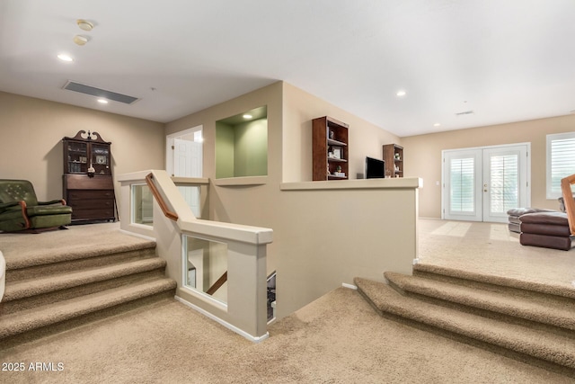 24916 N 80th Ln, Peoria, AZ 85383 - staircase featuring carpet flooring, recessed lighting, and french doors