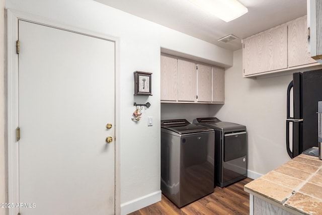 24916 N 80th Ln, Peoria, AZ 85383 - laundry room with cabinet space, independent washer and dryer, baseboards, and dark wood-type flooring