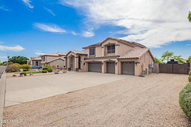 24916 N 80th Ln, Peoria, AZ 85383 - mediterranean / spanish-style house featuring a garage, a gate, stucco siding, concrete driveway, and fence