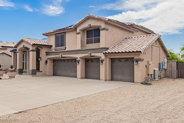 24916 N 80th Ln, Peoria, AZ 85383 - mediterranean / spanish-style house featuring a tiled roof, stucco siding, an attached garage, solar panels, and driveway