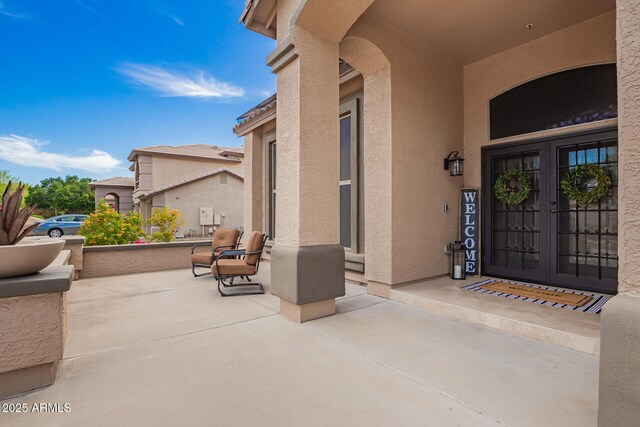 24916 N 80th Ln, Peoria, AZ 85383 - doorway to property with stucco siding and french doors