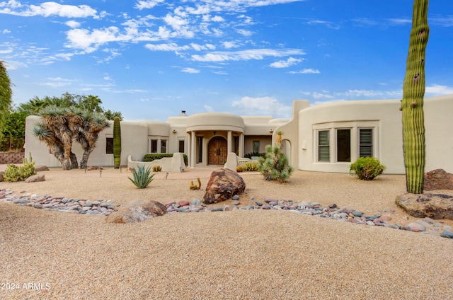 view of adobe home