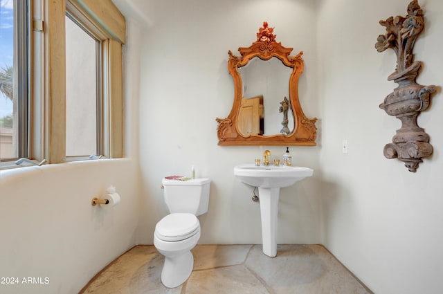 bathroom featuring toilet