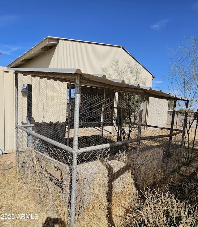 exterior space featuring an outbuilding